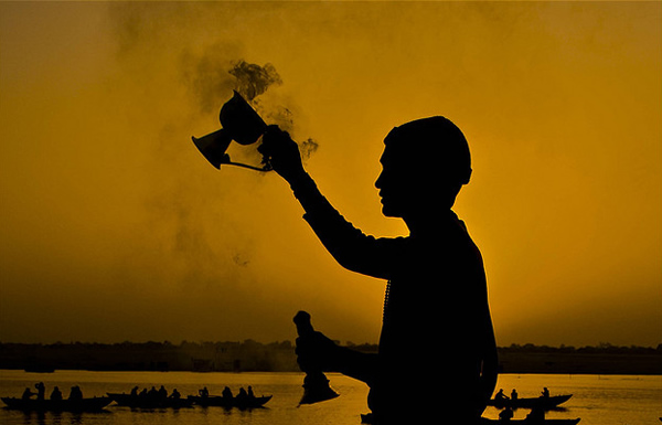 Greeting the Sun God - Benares, India