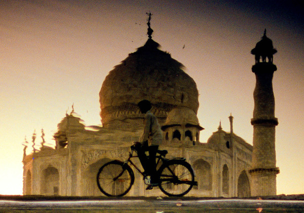 Boy and Taj Mahal in River