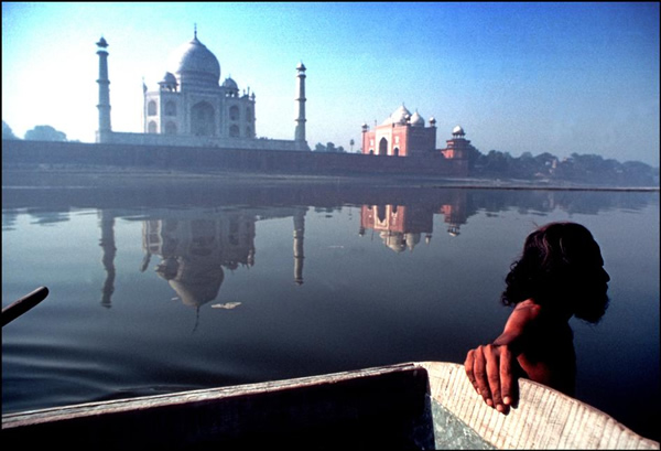 Boatman on the river by Ian Berry