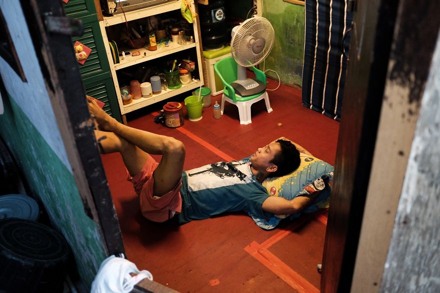 Young Man Relaxing In His Small House