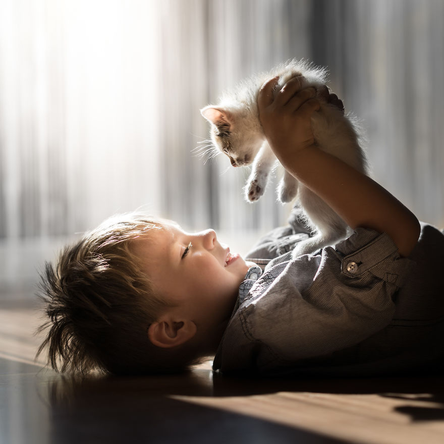 Photographer Iwona Podlasińska Captured The Most Magical Moments of His Son With Cats