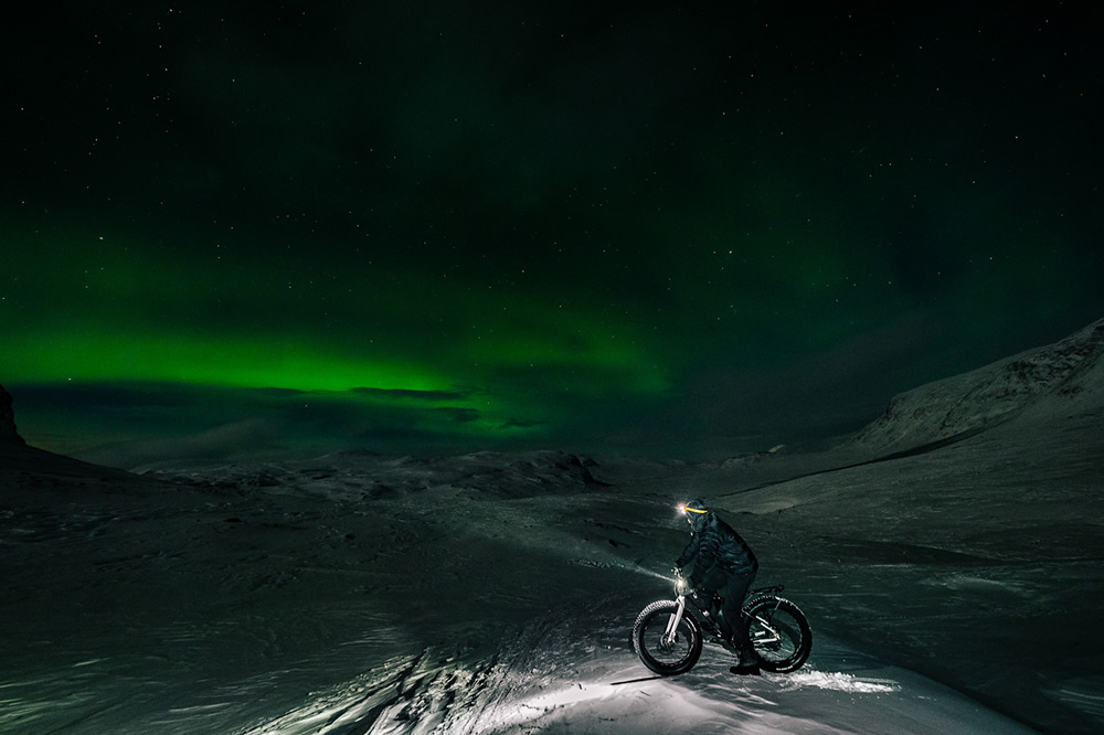 Kungsleden: Cycling Under Aurora Borealis by Jakub Rybicki