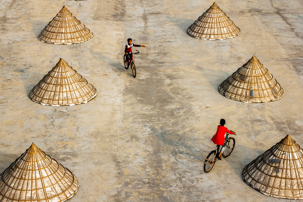 Drying The Paddy In The Sunlight Chatal By Rayhan Ahmed