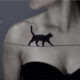 Tattoo Artist Creates Black Ink Tattoo Designs That Flow With The Body’s Curvature