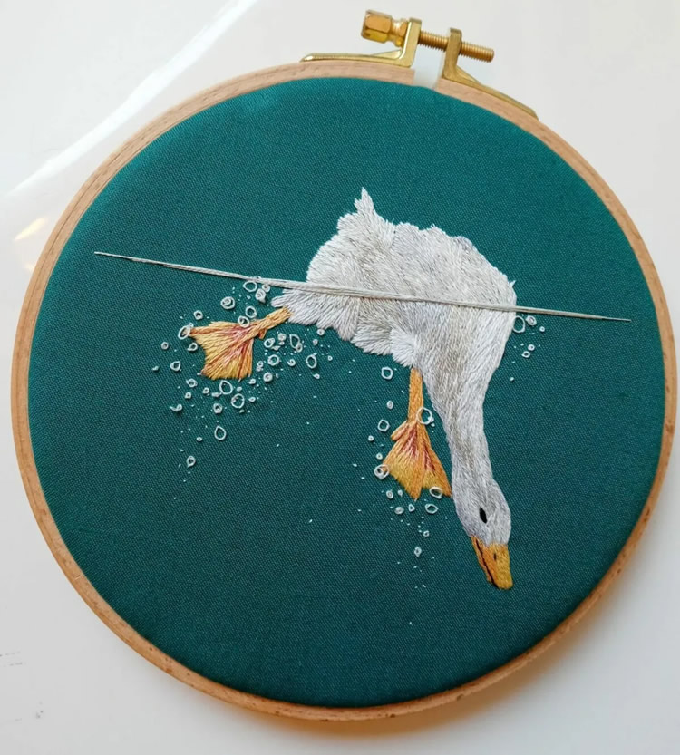 Embroideries Of Animals Plunging Into The Water by Megan Zaniewski