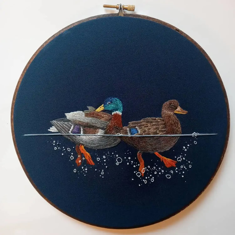 Embroideries Of Animals Plunging Into The Water by Megan Zaniewski