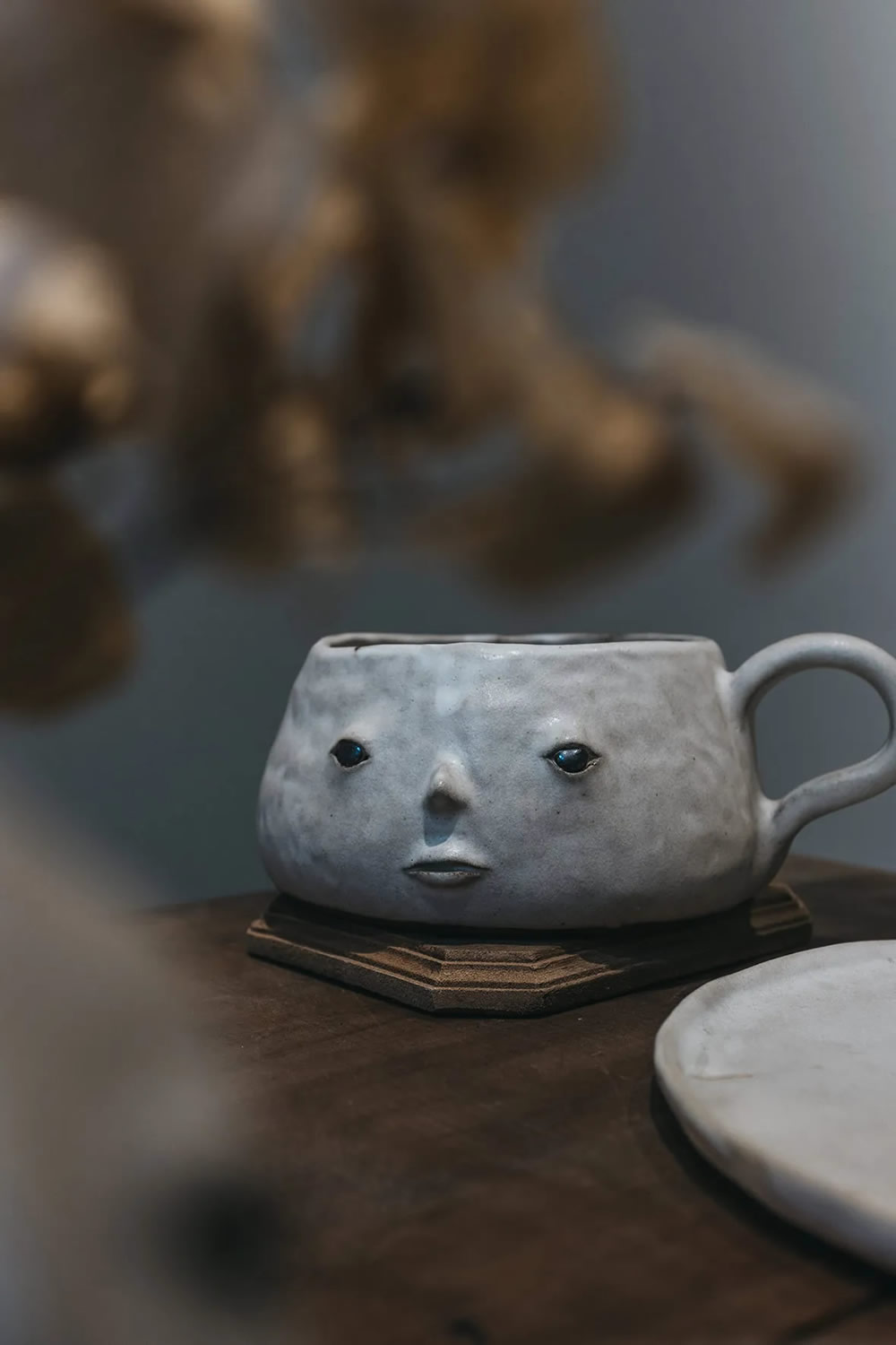 Emotive Little Faces Sculptures by Fan Yanting