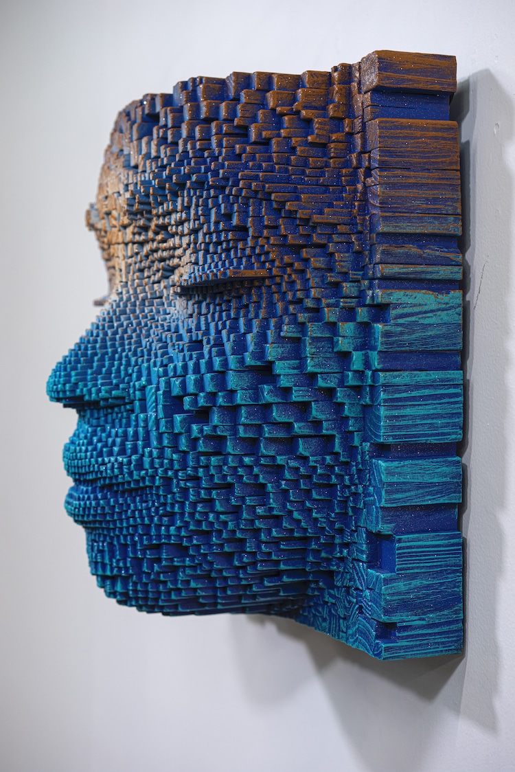 Serene Faces With Burnt Wood Sticks By Gil Bruvel