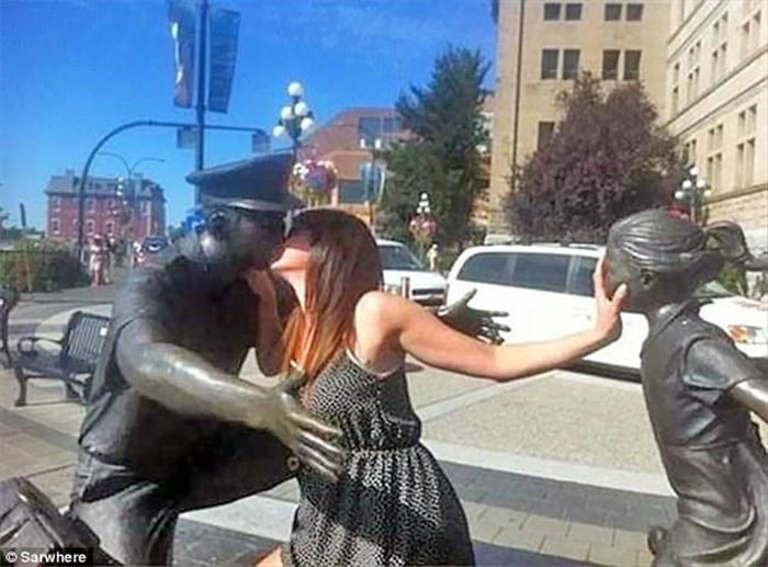 Funny People Posing With Statues