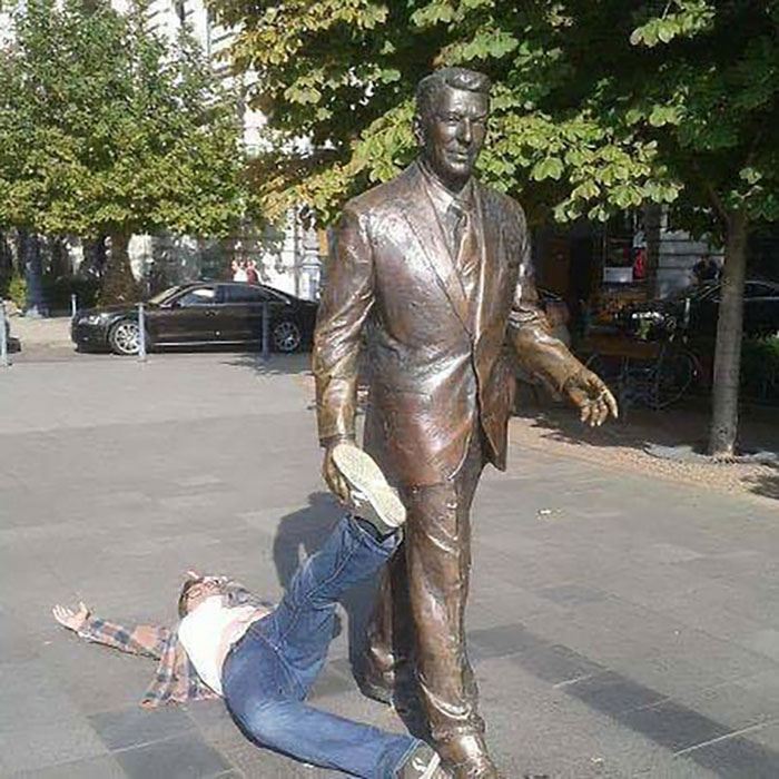 Funny People Posing With Statues