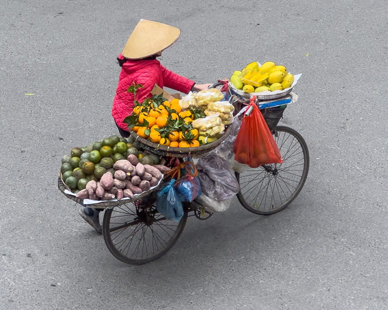 Street Photos Of Fruit Merchants In Hanoi by Trung Dong