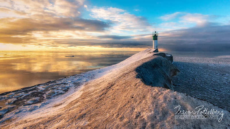 Lighthouse In Various Seasons By Trevor Pottelberg