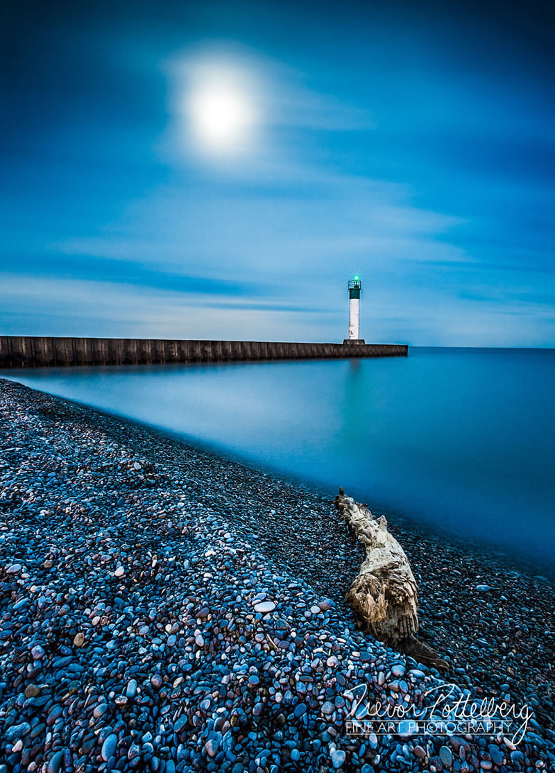 Lighthouse In Various Seasons By Trevor Pottelberg