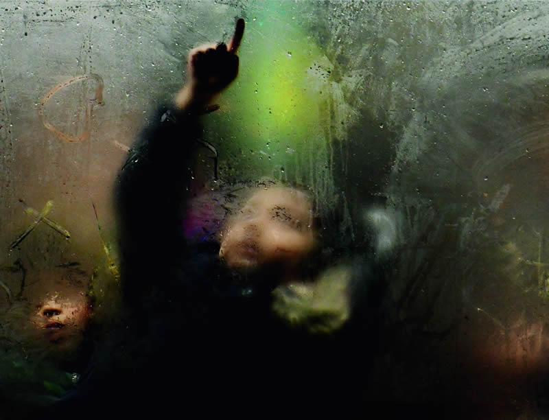 London Commuters Through Misty Bus Windows by Steve Madden